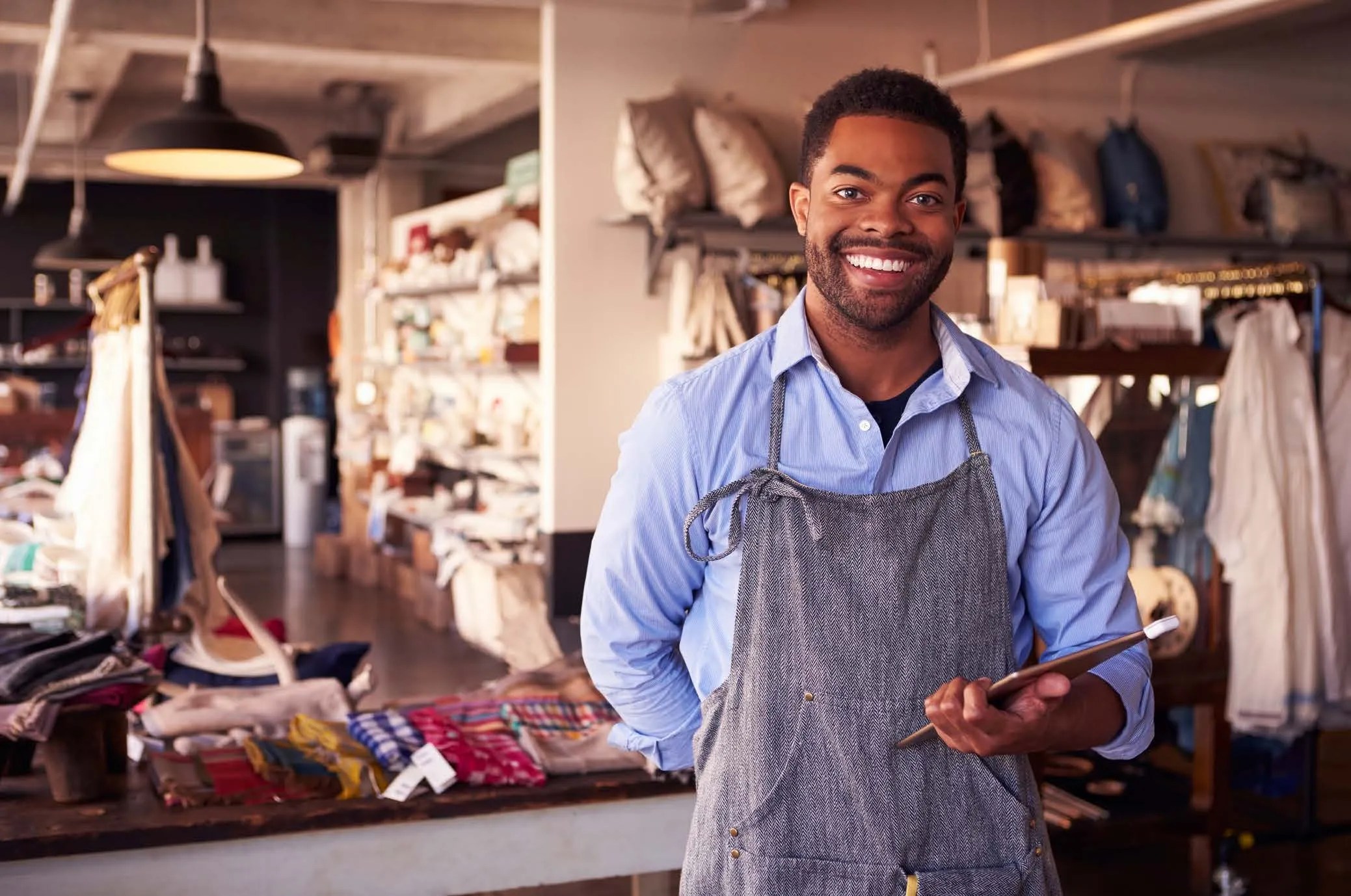 Male business owner smiling Lady clapping and laughing